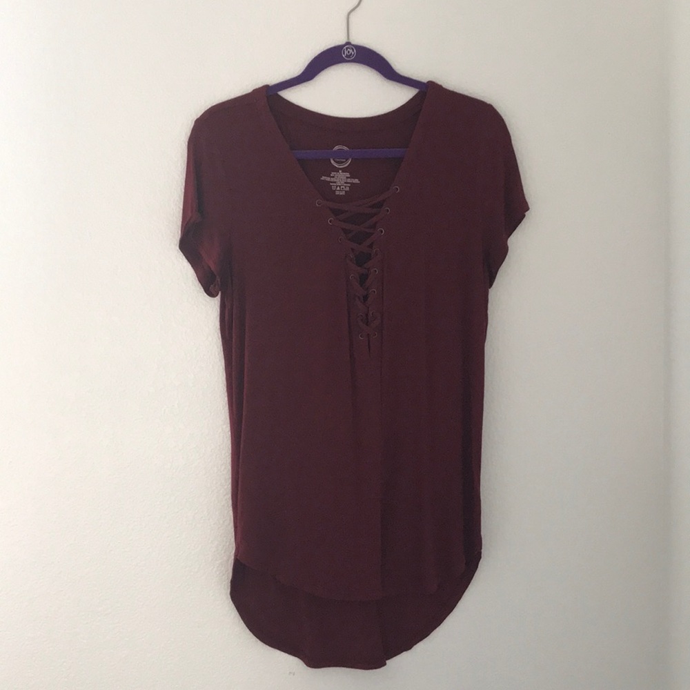 Deep V cut shirt with lace up design